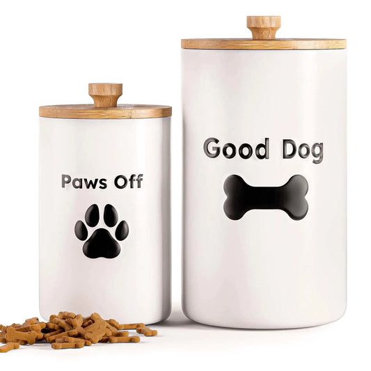 Ceramic dog treat containers with airtight bamboo lids, set of 2 sizes, featuring "Paws Off" and "Good Dog" designs.