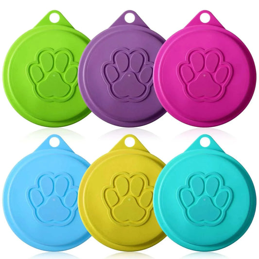 Assorted color pet food can lids with cute paw design, reusable and airtight, suitable for most cans.